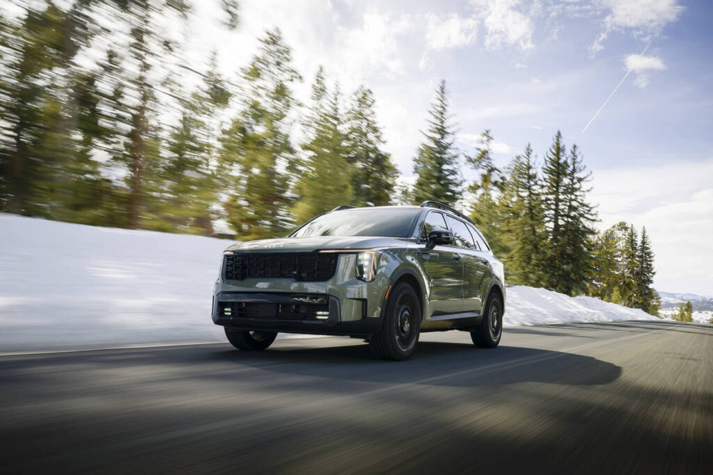 2027 Kia Sorento X-Line driving on a snowy road