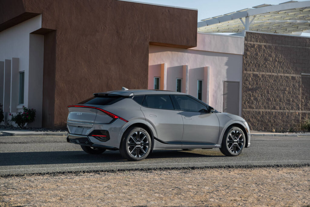 2027 Kia EV6 parked outside a desert building
