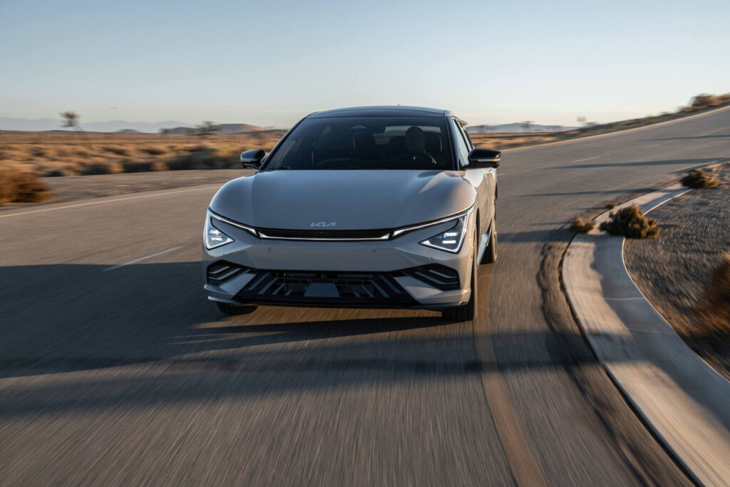 2027 Kia EV6 head-on at speed on a desert road
