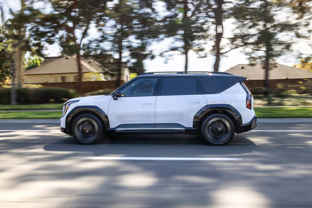 2027 Kia EV9 in profile on a suburban street